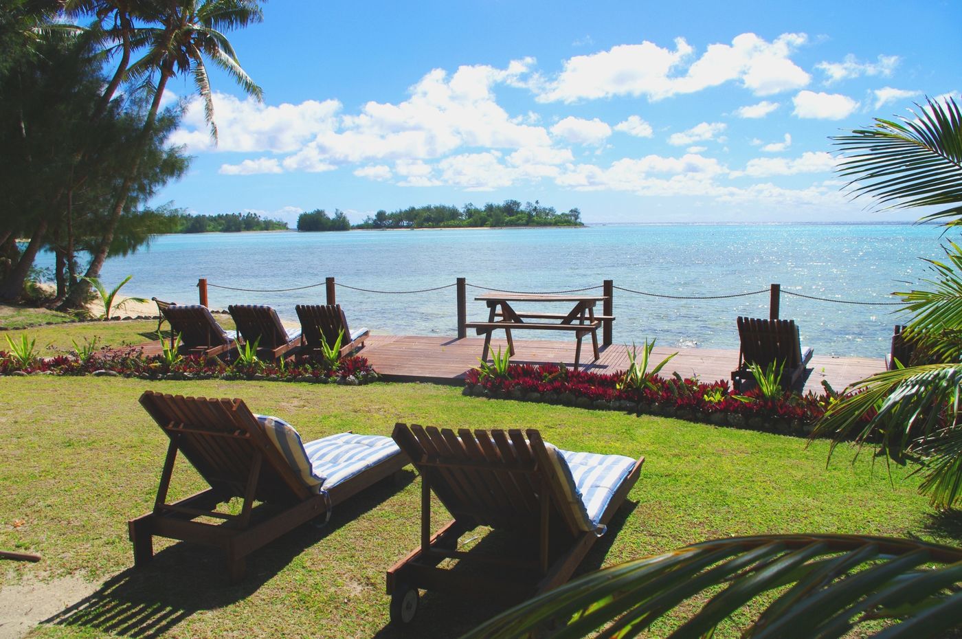 Beachfront deck overlooking Koromiri islet at Muri Beach Resort