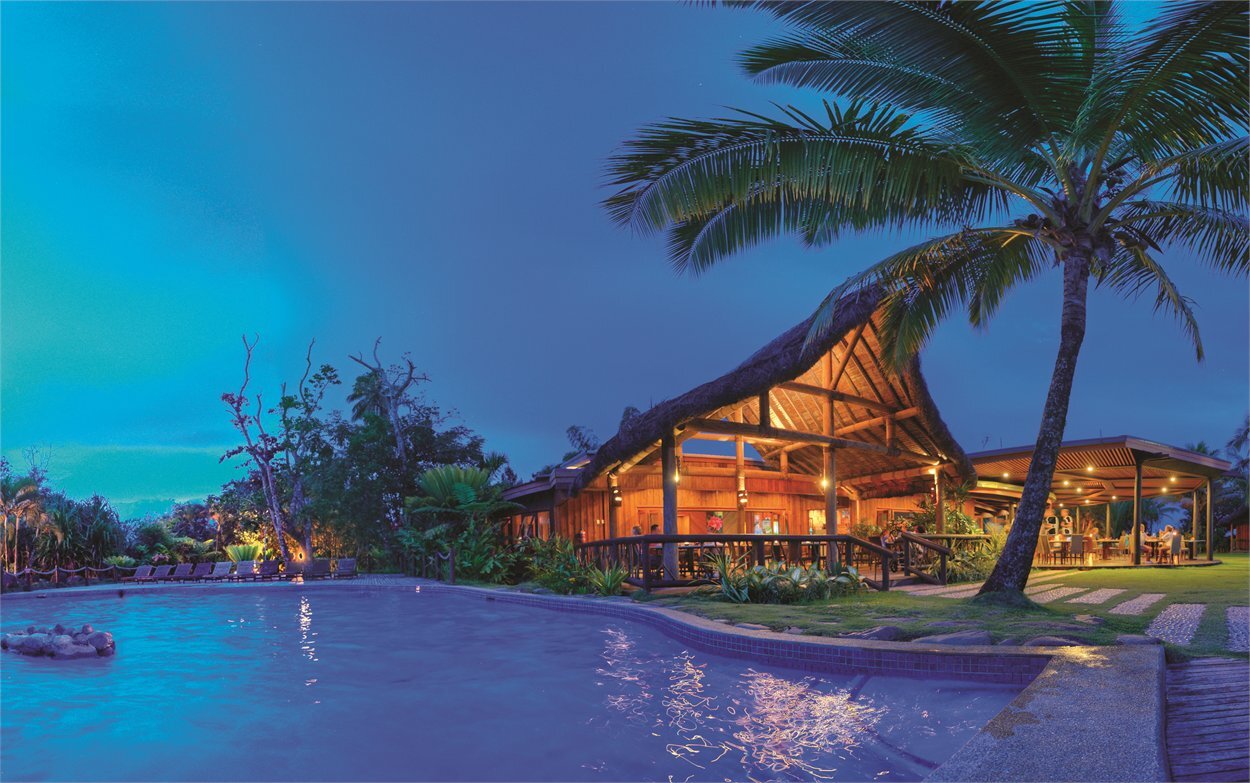 The Uprising Beach Resort — beachfront pool at dusk, Pacific Harbour