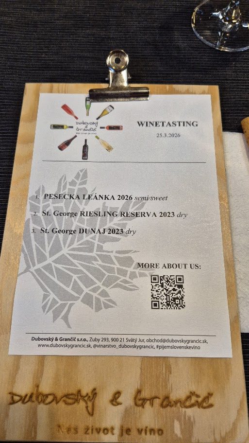 Wine-tasting list on a wooden board at a family-run winery near Bratislava