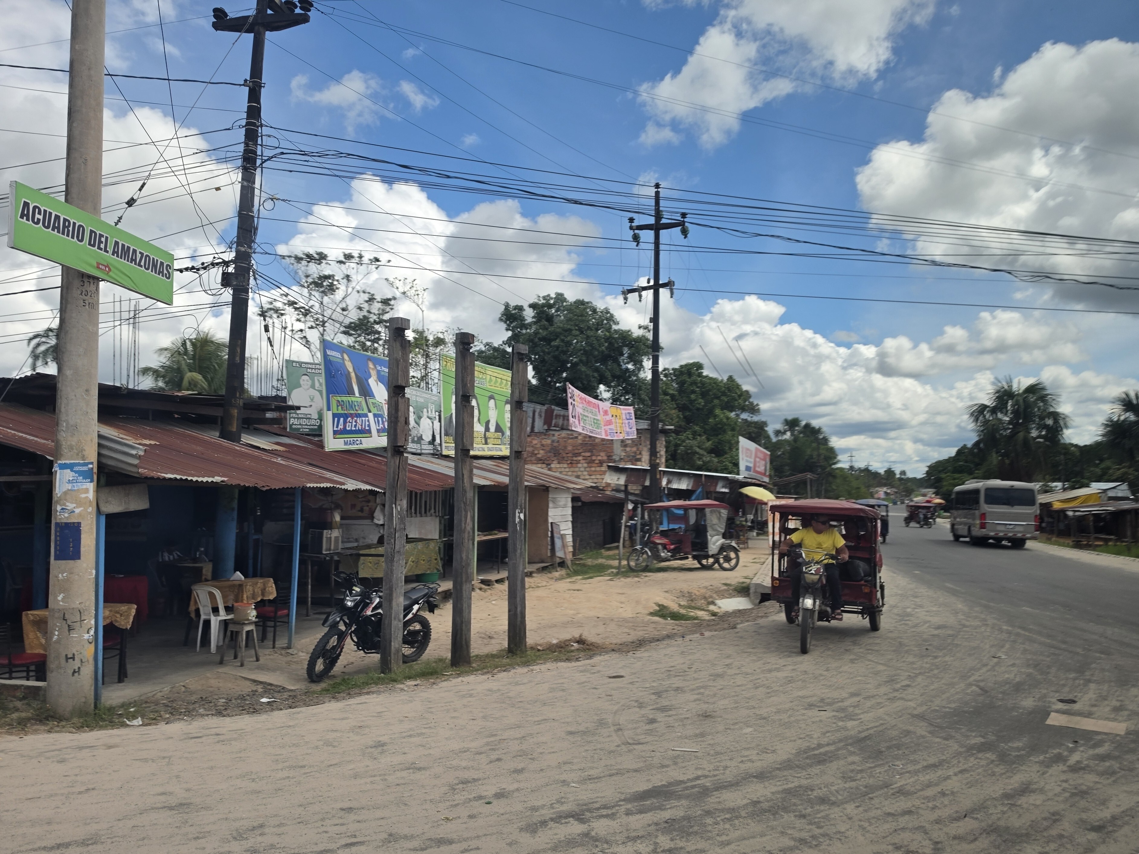 The road from Iquitos to Nauta, lined with stalls and tuk tuks