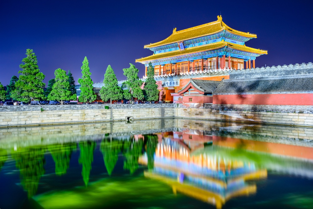 Beijing, China at the northern gate of the Forbidden City. (Upper tablet reads "Gate of Divine Might," lower tablet reads "Palace Museum